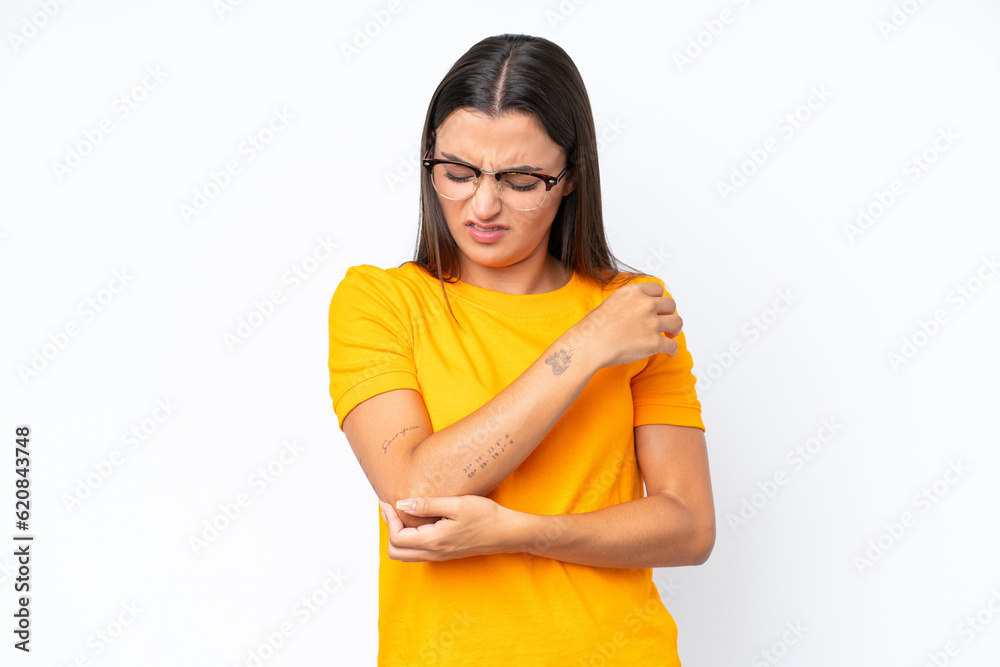 Young caucasian woman isolated on white background with pain in elbow Young caucasian woman isolated on white background with pain in elbow
