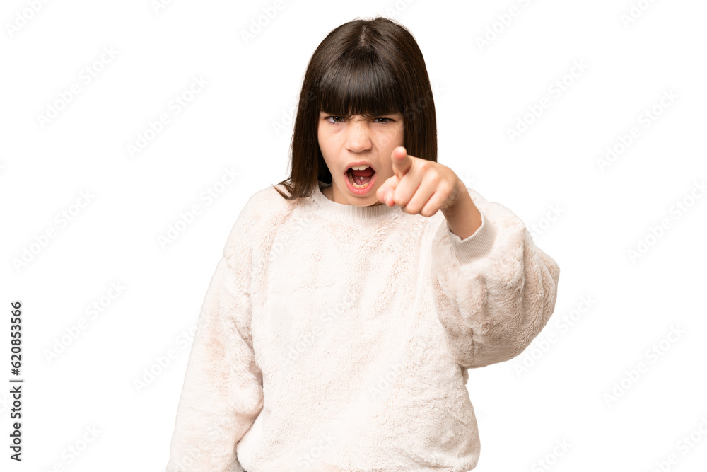 Little girl over isolated green chroma key background frustrated and pointing to the front Little girl over isolated green chroma key background frustrated and pointing to the front