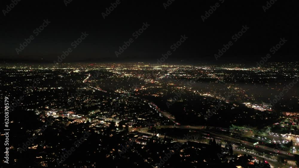 fireworks go off across city - aerial view fireworks go off across city - aerial view
