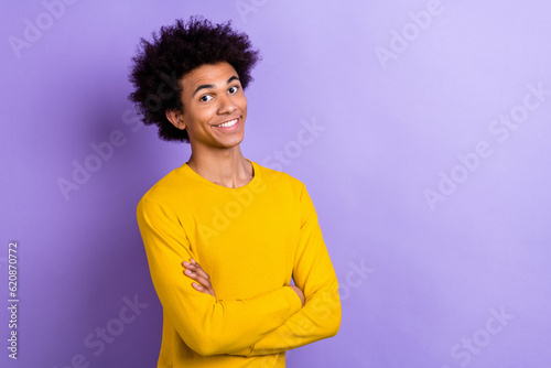 Portrait of cheerful successful person toothy smile crossed arms empty space advertisement isolated on purple color background