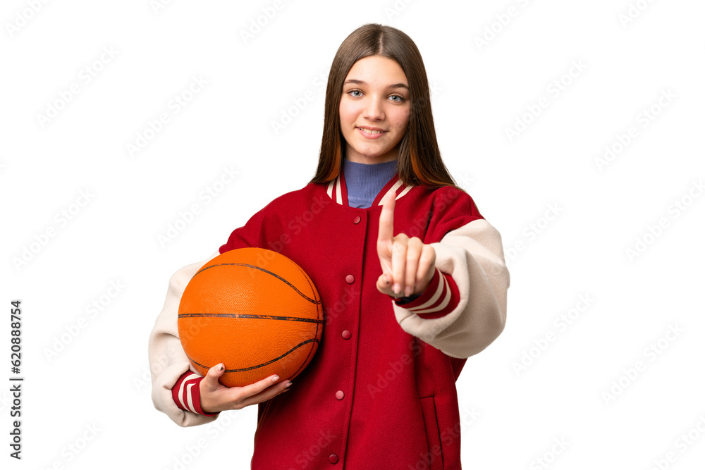 Teenager girl playing basketball over isolated chroma key background showing and lifting a finger Teenager girl playing basketball over isolated chroma key background showing and lifting a finger