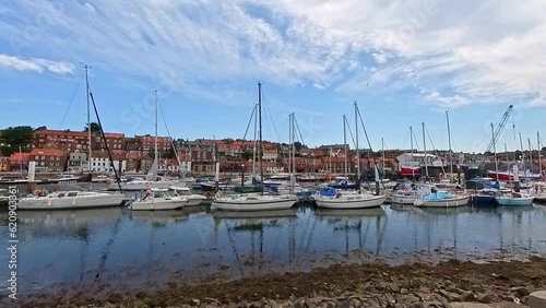 Sailboats and yachts in the marina in the seaside town of Whitby on the North Yorkshire coast. Captured on a bright and sunny summer day