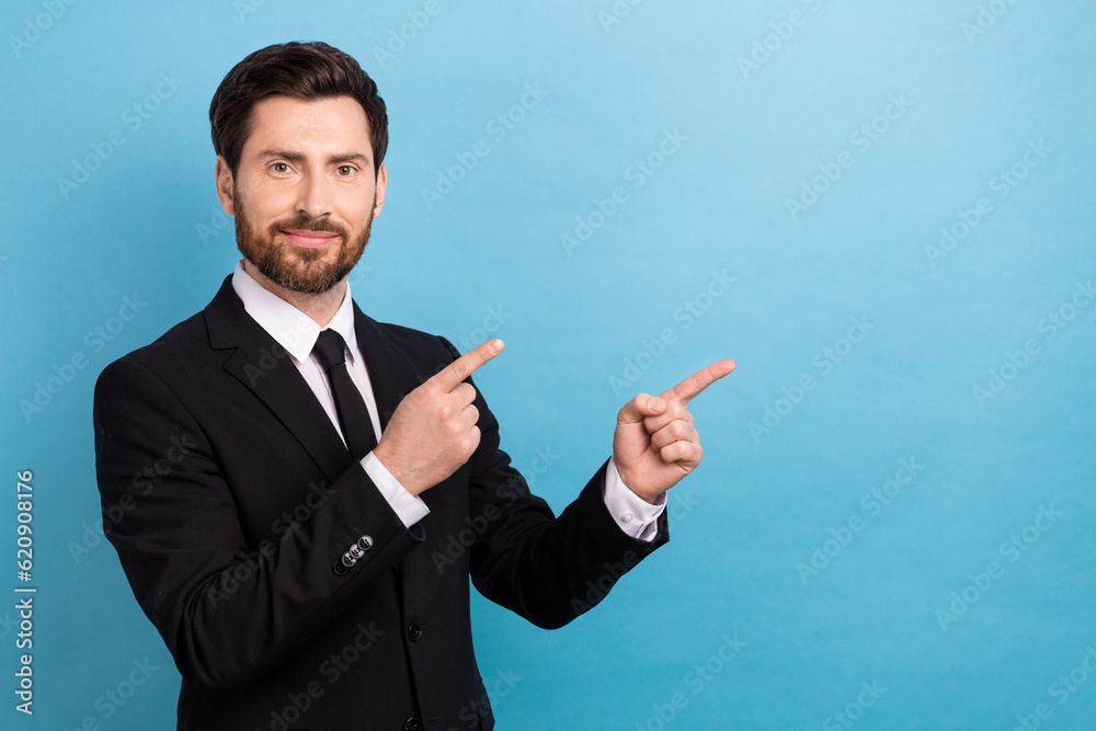 Photo of professional manager young wear stylish trendy formal jacket direct fingers mockup warranty isolated on blue color background Photo of professional manager young wear stylish trendy formal jacket direct fingers mockup warranty isolated on blue color background