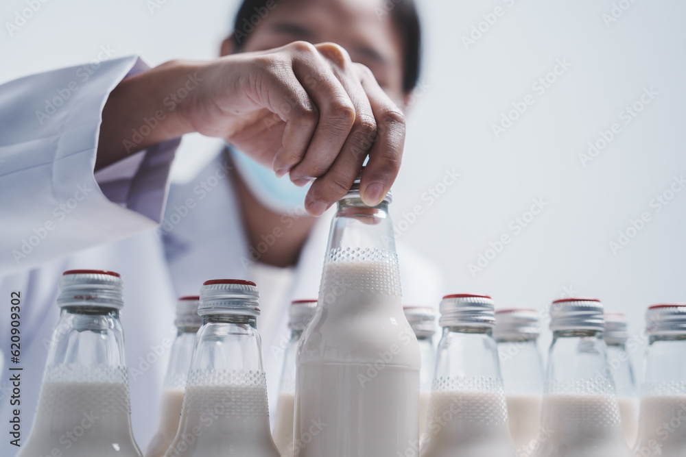 Quality control laboratory dairy factory professional people checking
