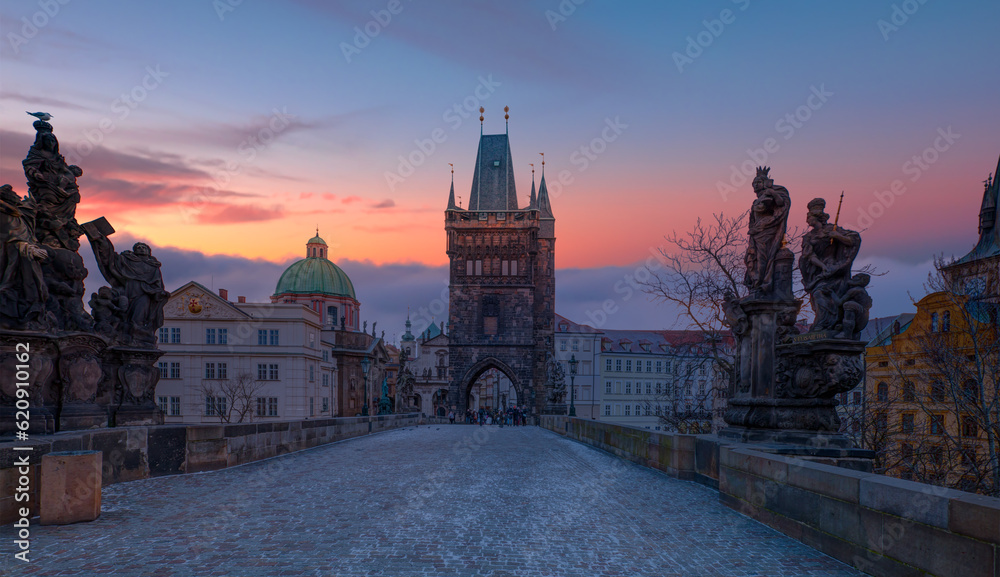 Obraz premium View of Charles Bridge and Lesser Bridge Tower in Prague, Czech Republic