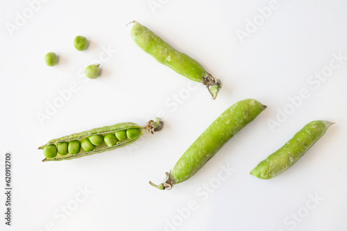 Sweet green peas. View from above. White background.