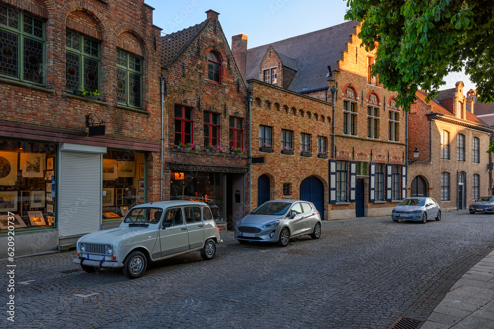 Old cozy street in Bruges (Brugge), Belgium. Cityscape of Bruges. Typical architecture of Bruges