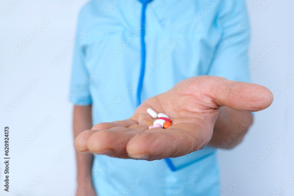 doctor holds drugs in hand, close-up medicinal capsules, pills, vitamins in male palm, ensuring delivery of proper medication and healthcare support, concept medication management, healthcare services doctor holds drugs in hand, close-up medicinal capsules, pills, vitamins in male palm, ensuring delivery of proper medication and healthcare support, concept medication management, healthcare services