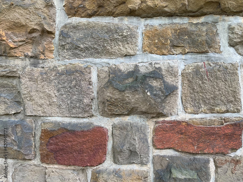 Close Up Stone Wall Texture with big bricks on ancient historic church in Germany, Europe