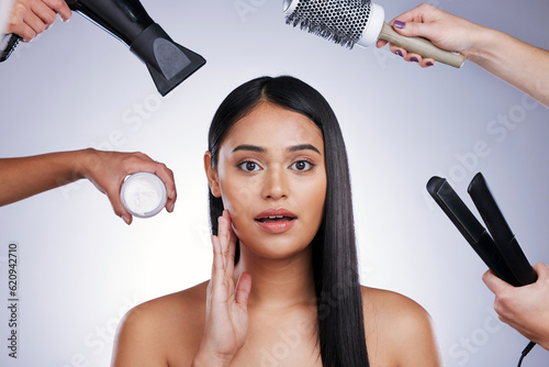 Beauty, portrait and woman in studio for makeover, grooming and and treatment on white background. Face, haircare and hands of styling team with female wellness model for glamour keratin results