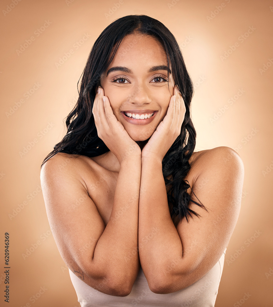 Obraz premium Portrait, happy woman and skincare touch for beauty isolated on a brown background in studio. Face, natural cosmetics and smile of model with spa treatment for aesthetic, wellness and skin health.