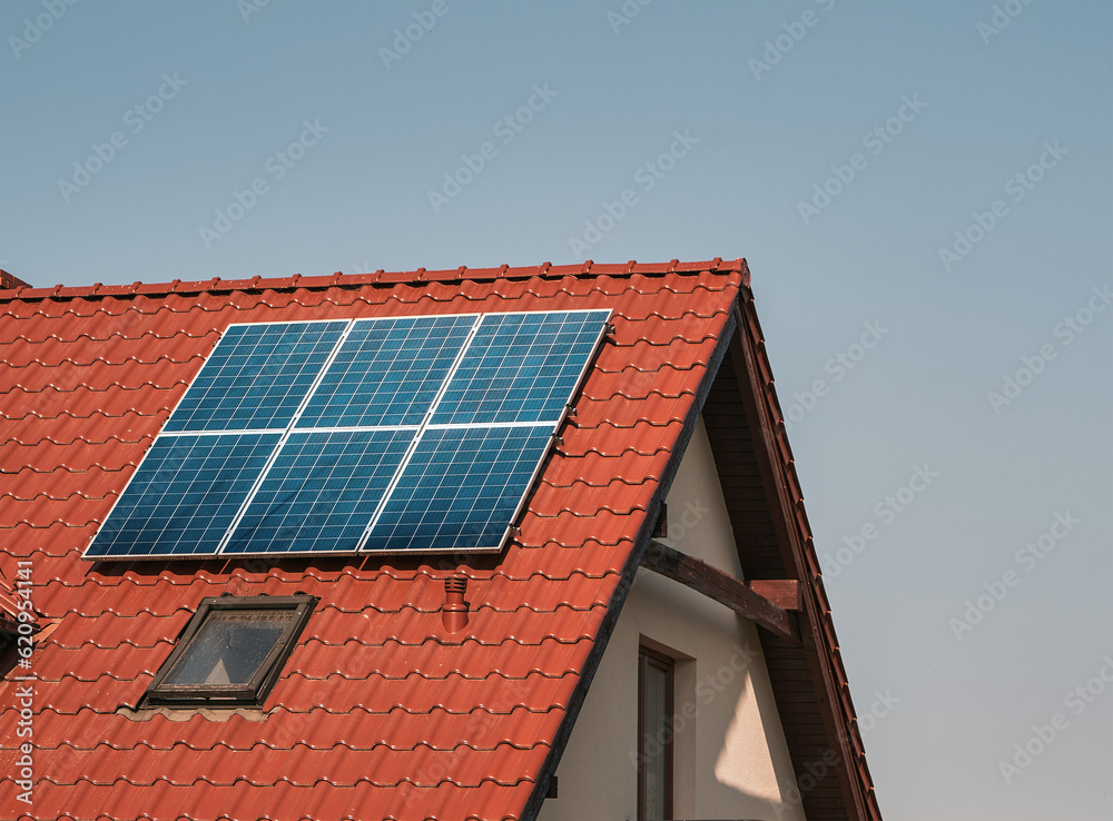 Harvesting the Sun. Sustainable Power Generation with a Solar Photovoltaic Systems on a Countryside House. Sun-produced energy. Semiconductor technology. Carbonless footprint. Harvesting the Sun. Sustainable Power Generation with a Solar Photovoltaic Systems on a Countryside House. Sun-produced energy. Semiconductor technology. Carbonless footprint.