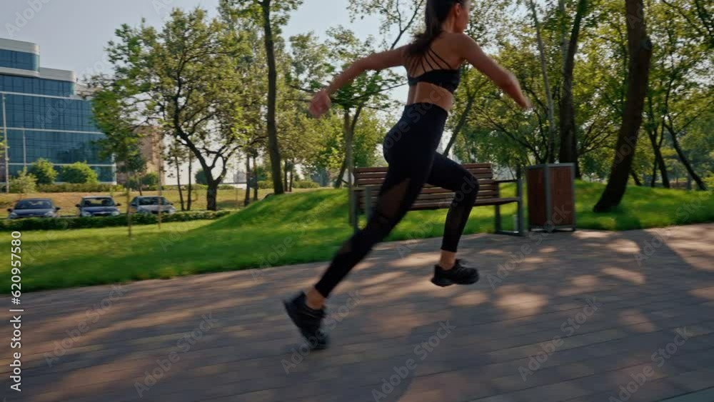 cardiovascular fitness athlete training at sunny day park aerobic exercise in the morning slow motion cardiovascular fitness athlete training at sunny day park aerobic exercise in the morning slow motion