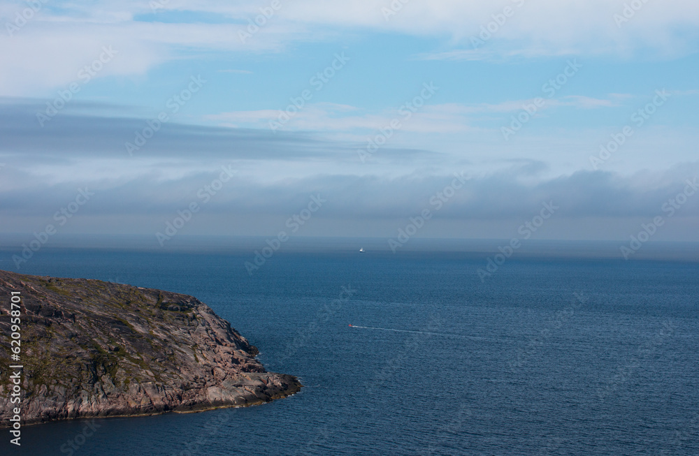 Northern mountains, the sea and mountain cold lakes on the Kola peninsula. Teriberka village