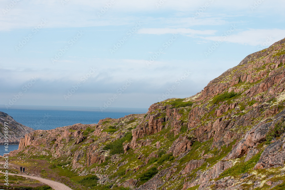 Northern mountains, the sea and mountain cold lakes on the Kola peninsula. Teriberka village Northern mountains, the sea and mountain cold lakes on the Kola peninsula. Teriberka village