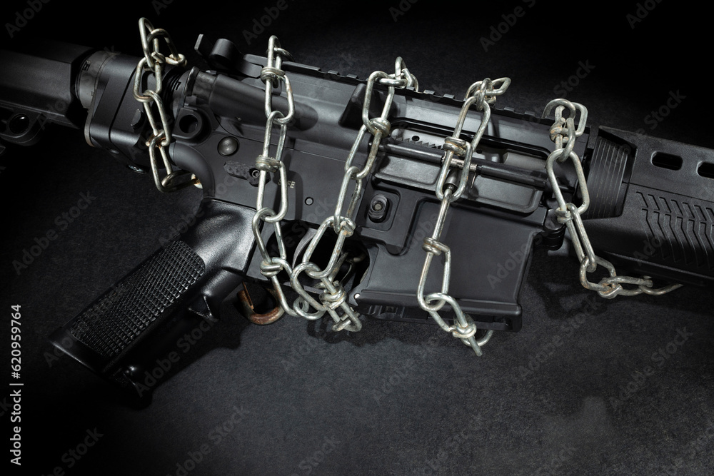 Fototapeta premium AR-15 chained up by regulations