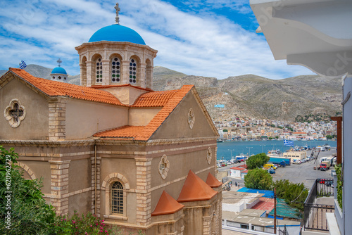 View of Holy Church of Saint Nicholas and harbour in the background, Kalimnos, Dodecanese Islands, Greek Islands photo