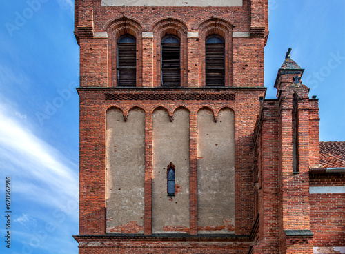 Fototapeta Naklejka Na Ścianę i Meble -  General view and architectural details of the Neo-Gothic Catholic Church of St. Joseph in Kobułty, Masuria, Poland.