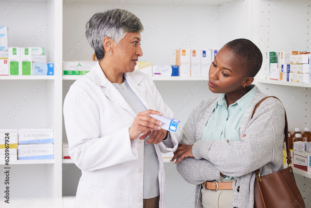 Fototapeta premium Pharmacist, women and consulting customer for medicine info, healthcare services and product advice. Pharmacy, client and consultation for box, pills and trust in retail store or pharmaceutical shop