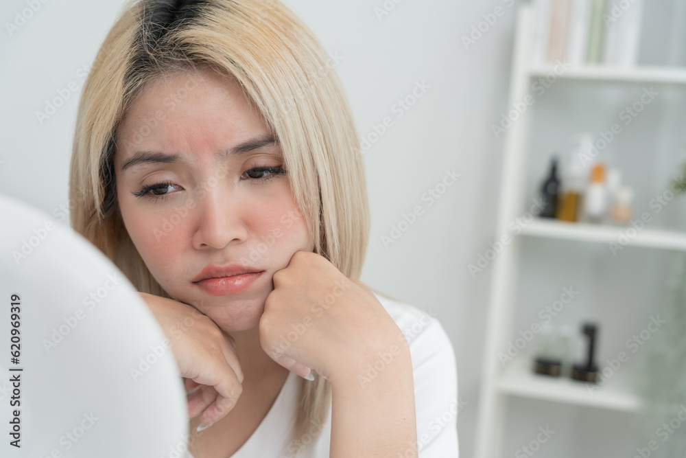 Woman worried about face Dermatology, rosacea dermatitis, allergic steroids, sensitive skin, red face from sunburn, acne, dry skin, large pores ,rash face, dull, freckles, wrinkle, skin problem