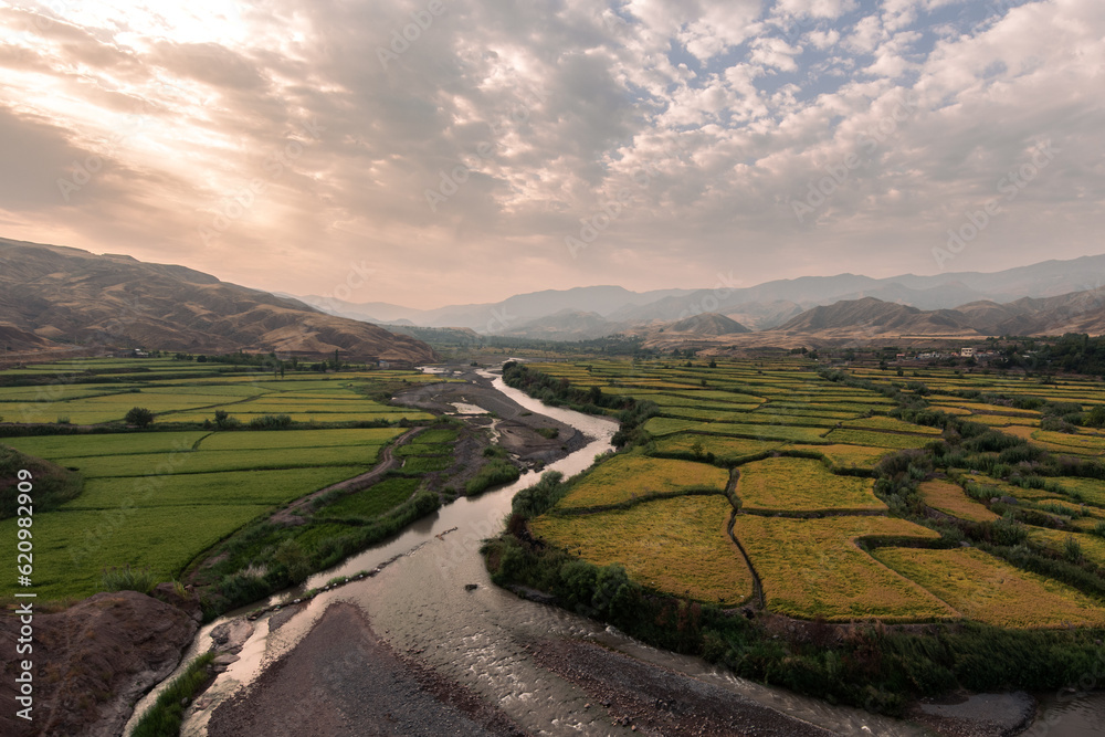 river leading to the rice field terraces, large landscape, green, sky, blue, clouds, spring river leading to the rice field terraces, large landscape, green, sky, blue, clouds, spring