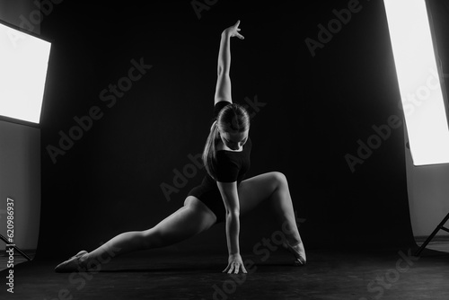 Wallpaper Mural Fashion girl ballet dancer. Sport gymnastics studio shot on white and black background Torontodigital.ca