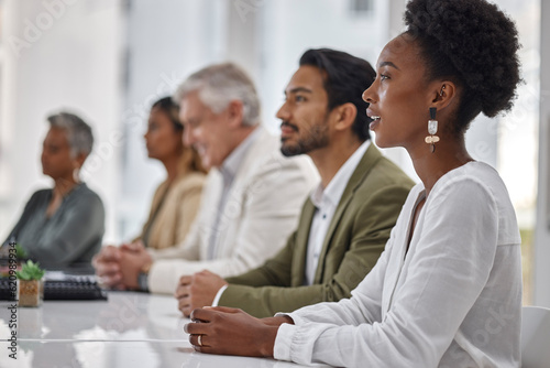 Diversity  corporate and black woman in a meeting or business conference for company development or growth. Listening  workshop and group or row of employees in training presentation for teamwork