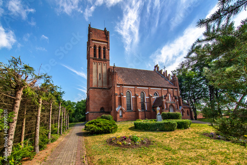 Fototapeta Naklejka Na Ścianę i Meble -  General view and architectural details of the Neo-Gothic Catholic Church of St. Joseph in Kobułty, Masuria, Poland.