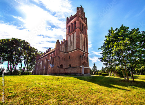 Fototapeta Naklejka Na Ścianę i Meble -  General view and architectural details of the Neo-Gothic Catholic Church of St. Joseph in Kobułty, Masuria, Poland.