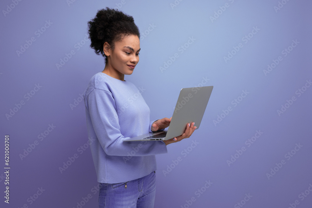 confident young afro hair brunette woman with laptop in office confident young afro hair brunette woman with laptop in office