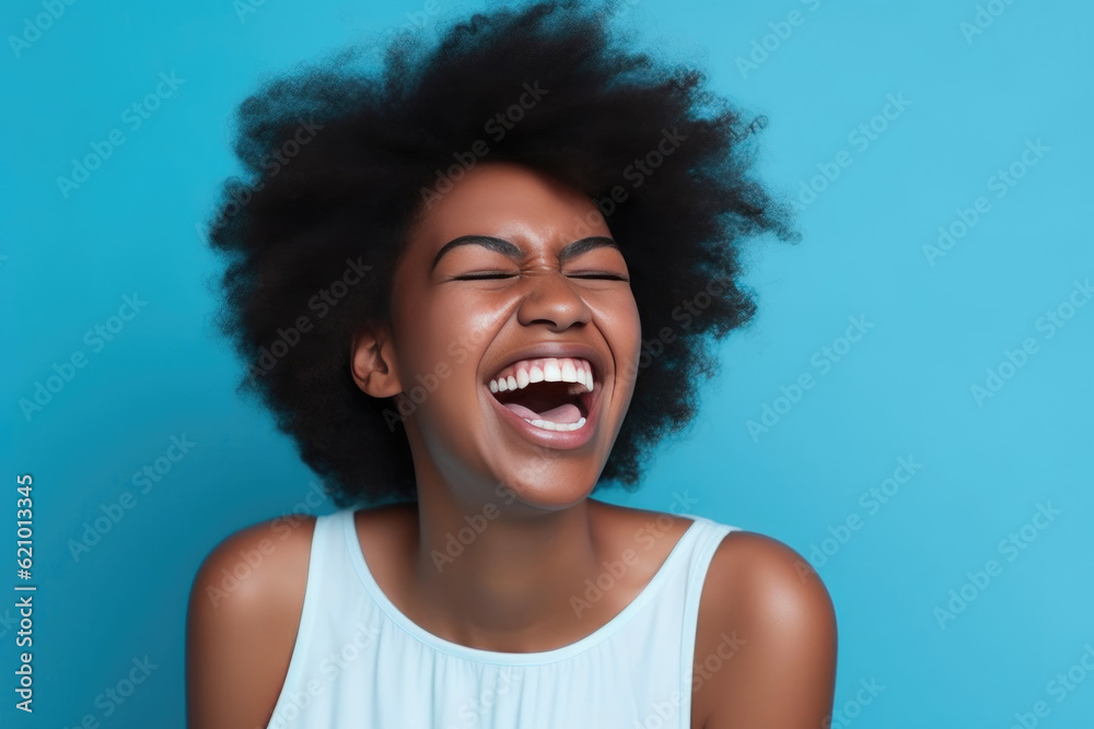 Energetic young African-American woman enjoying a laugh against a vibrant blue backdrop. Generative AI Energetic young African-American woman enjoying a laugh against a vibrant blue backdrop. Generative AI