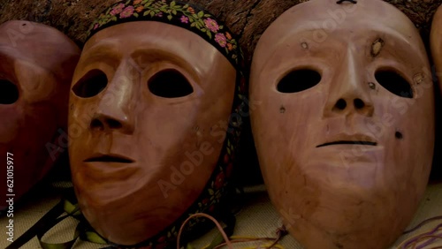 close-up shot wooden masks typical of the sardinia region in italy