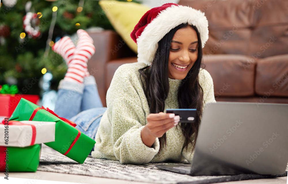 Christmas, online shopping and woman with laptop, credit card for payment for gift with internet banking. Female customer, smile for holiday donation and ecommerce for present, fintech and bank app Christmas, online shopping and woman with laptop, credit card for payment for gift with internet banking. Female customer, smile for holiday donation and ecommerce for present, fintech and bank app