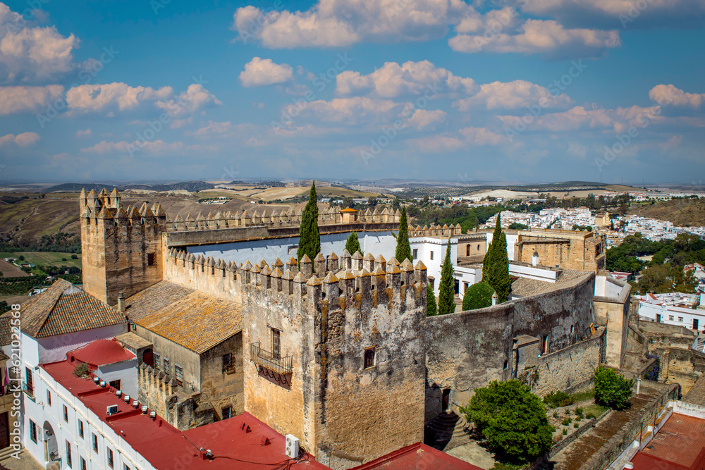 View of the castillo fortress of Arcos de la Frontera in Cadiz, Andalusia, Spain from the bell tower of the Basilica Menor de Santa María de la Asunción