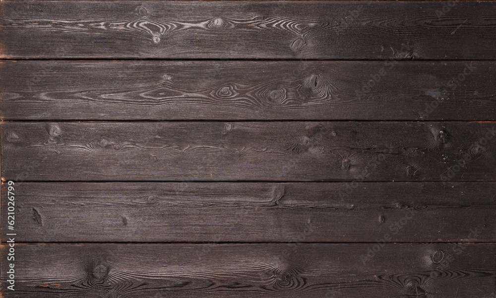 Dark brown wooden planks for a background