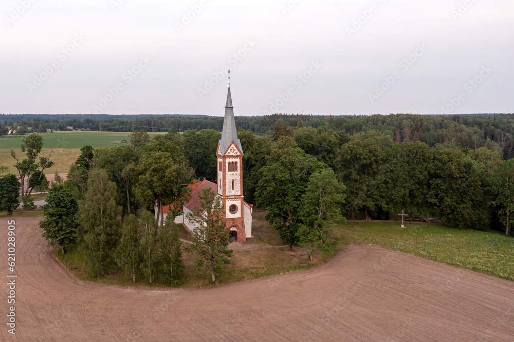 spring landscape with Krimulda Evangelical Lutheran Church, Latvia, drone view
