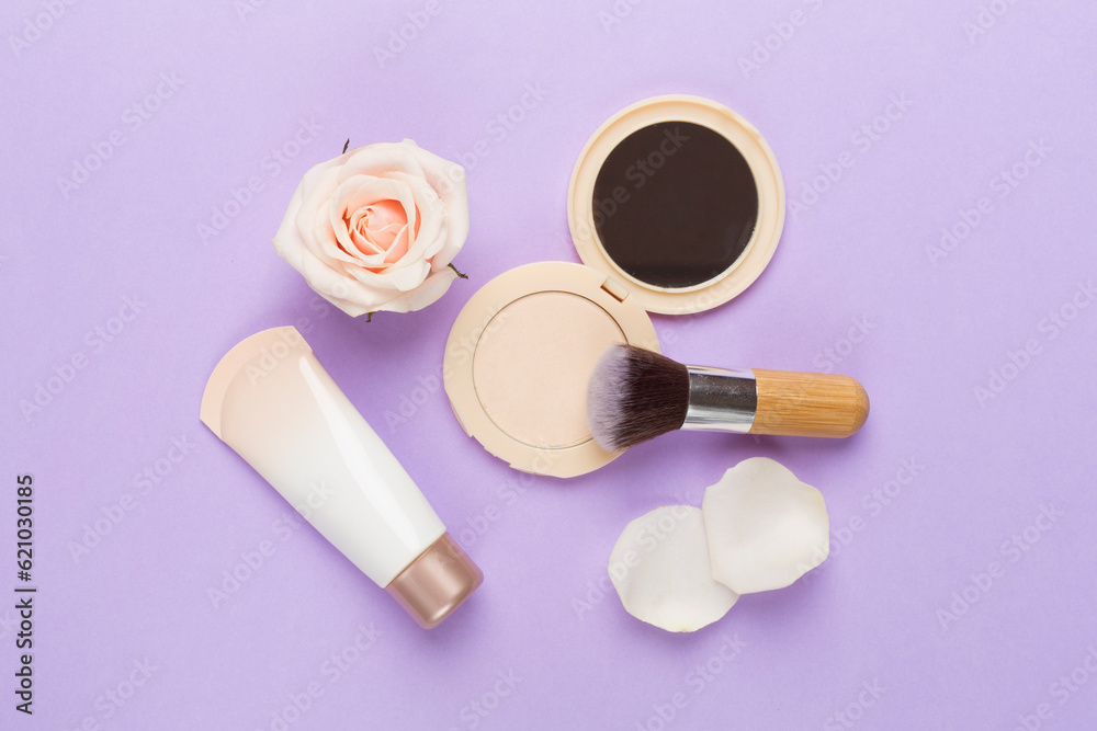 Composition with makeup products for skin tone on color background, top view Composition with makeup products for skin tone on color background, top view