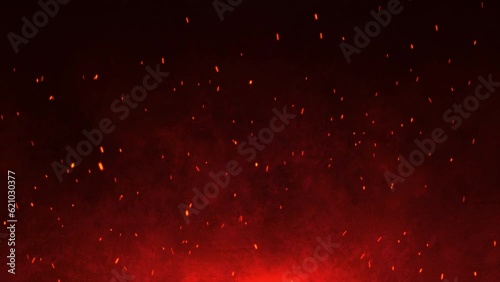 3D animation. Burning red hot sparks rise from large fire seamless loop. Background of bonfire, light and life. Fiery orange glowing flying ember particles on black background photo