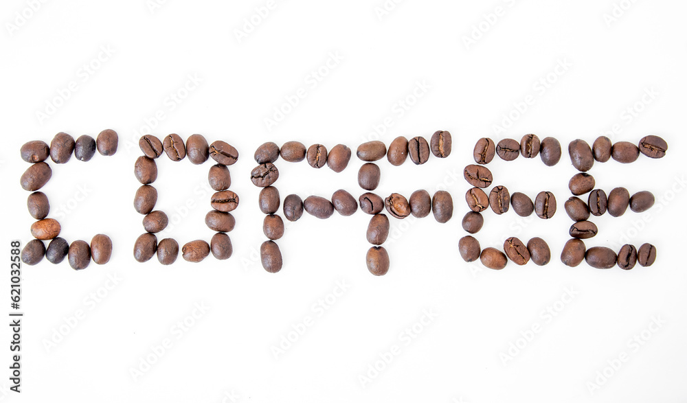 Coffee beans arranged in the word coffee on a white background Coffee beans arranged in the word coffee on a white background