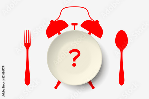 Empty plate and alarm clock, concept of dieting and interval fasting