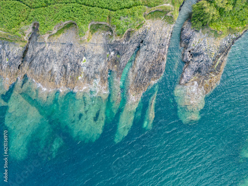 An aerial view looking down at the rocky coast of Pendennis Point near Falmouth, Cornwall, UK photo