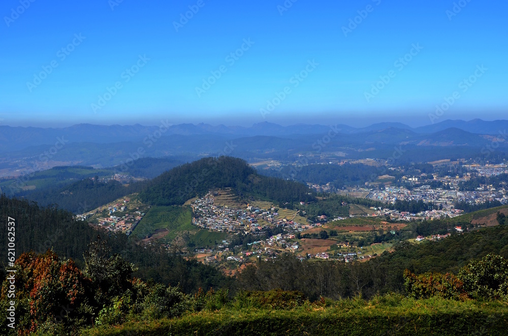A beatiful view of towns among mountain valleys