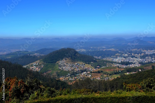 A beatiful view of towns among mountain valleys