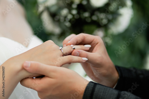 exchange of wedding rings, wedding ceremony.close-up of engagement and wedding rings