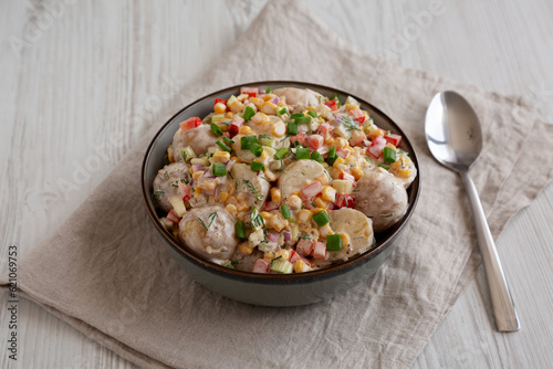 Homemade Summer Potato Salad in a Bowl, side view.