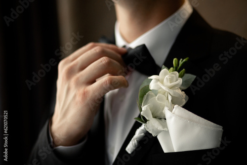Boutonniere on the jacket. classic wedding