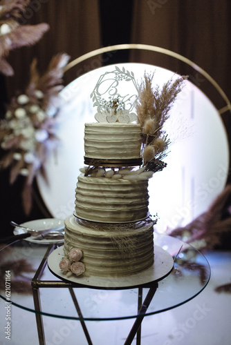 
wedding cake at the evening cake cutting ceremony.
white cake