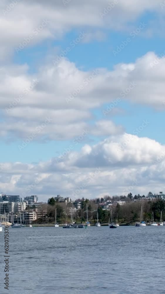 Granville Island Real life in part of Vancouver near Pacific Ocean ships people on bicycles seagulls weather relaxing sunny day in Canada 2023 Granville Island Real life in part of Vancouver near Pacific Ocean ships people on bicycles seagulls weather relaxing sunny day in Canada 2023