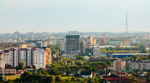 Aerial view of the urban cityscape of the center of Ivano-Frankivsk city in a summer sunny day © Vlad Kazhan