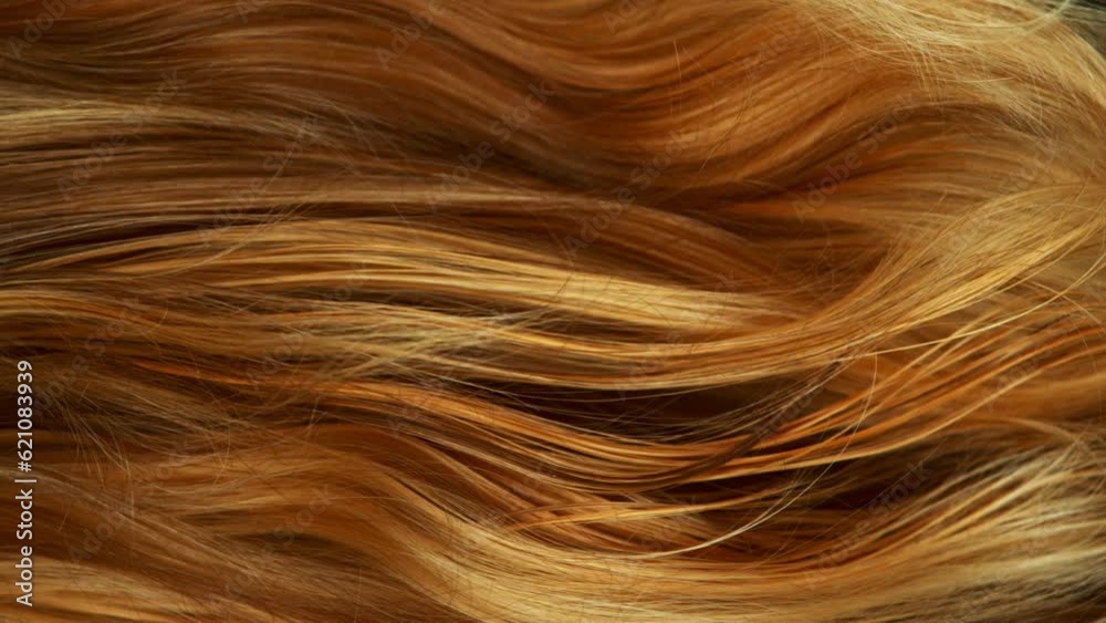 Super slow motion of wavy red hair in detail. Filmed on high speed cinema camera, 1000 fps.